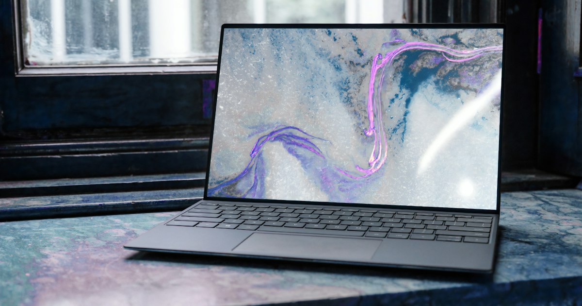 Professional working remotely on a laptop